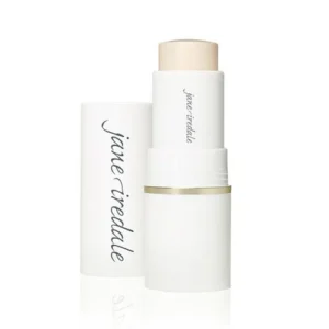 Jane Iredale concealer stick with cap off; white cylindrical case and beige balm visible.