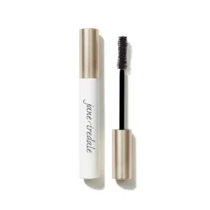 Open mascara tube with a gold cap next to the wand, showing the bristled applicator for eyelashes.