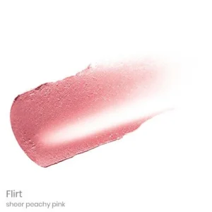 Lip color swatch in sheer peachy pink, labeled Flirt (lipstick shade).