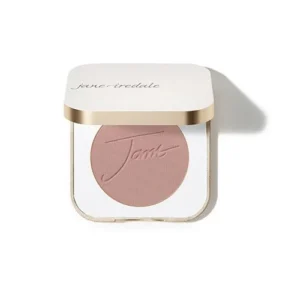 Jane Iredale pressed pink blush in a white compact with a gold band and embossed logo.