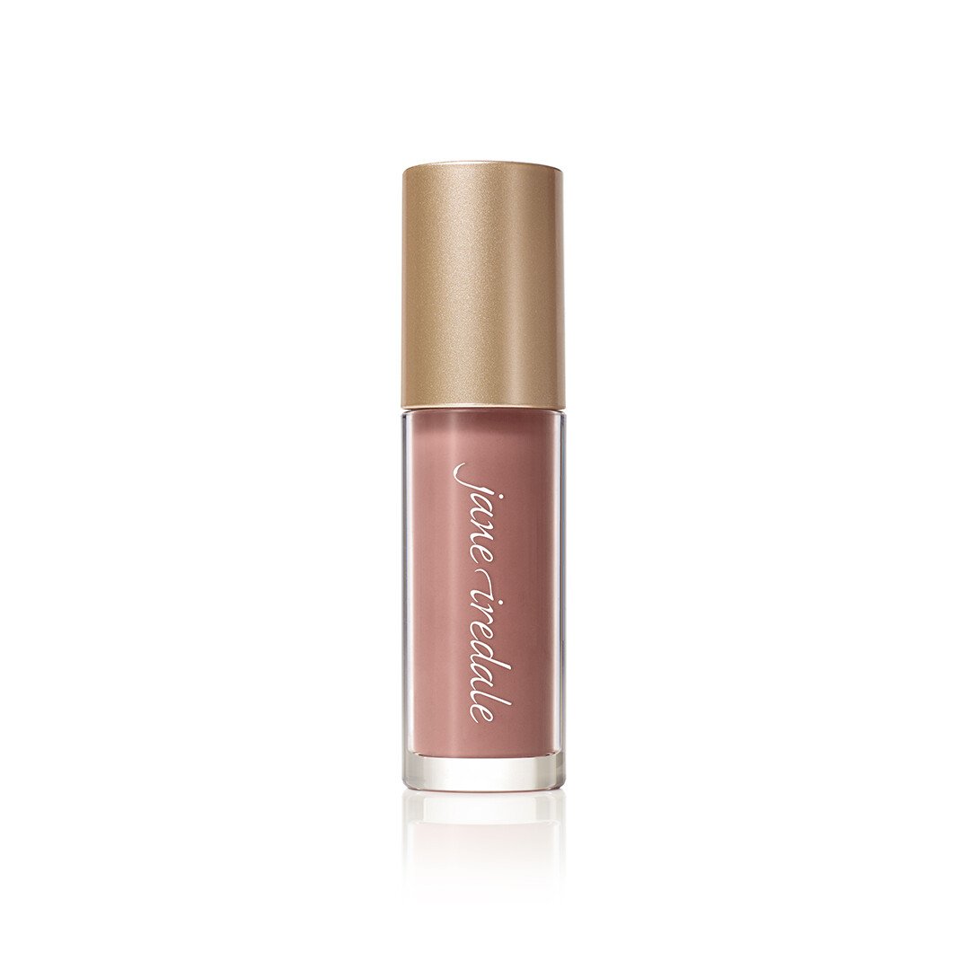 3154505272jpg – Damara Luxury Spa Vancouver Liquid lipstick in nude-pink shade with a gold cap and clear body, labeled Jane Iredale, on a white background.