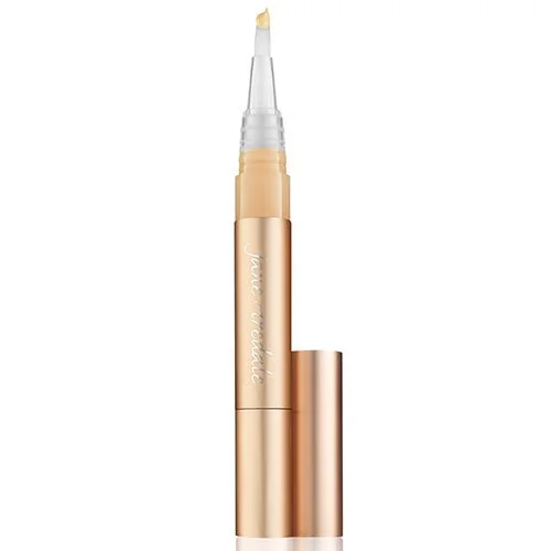 509777292 – Damara Luxury Spa Vancouver Rose-gold concealer pen with clear applicator wand and cap removed.