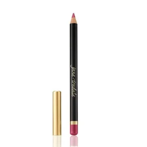 Black lip liner pencil with pink tip and gold cap beside, product packaging visible for cosmetics.