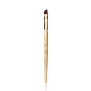 Angled eyeliner brush with a light wood handle and brown bristles