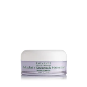 White cosmetic jar with a lavender label that reads 'Bakuchiol + Niacinamide Moisturizer' on a reflective surface