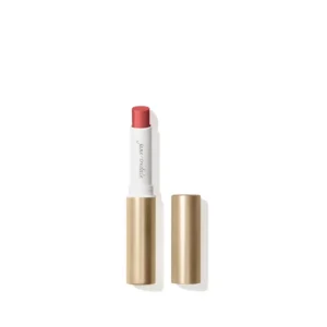 Lipstick in a white case with coral-pink bullet, set against a white background, shown vertically with shadow.