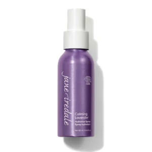 Purple lavender-hued spray bottle with a white cap and label reading 'Calming Lavender Hydration Spray'.