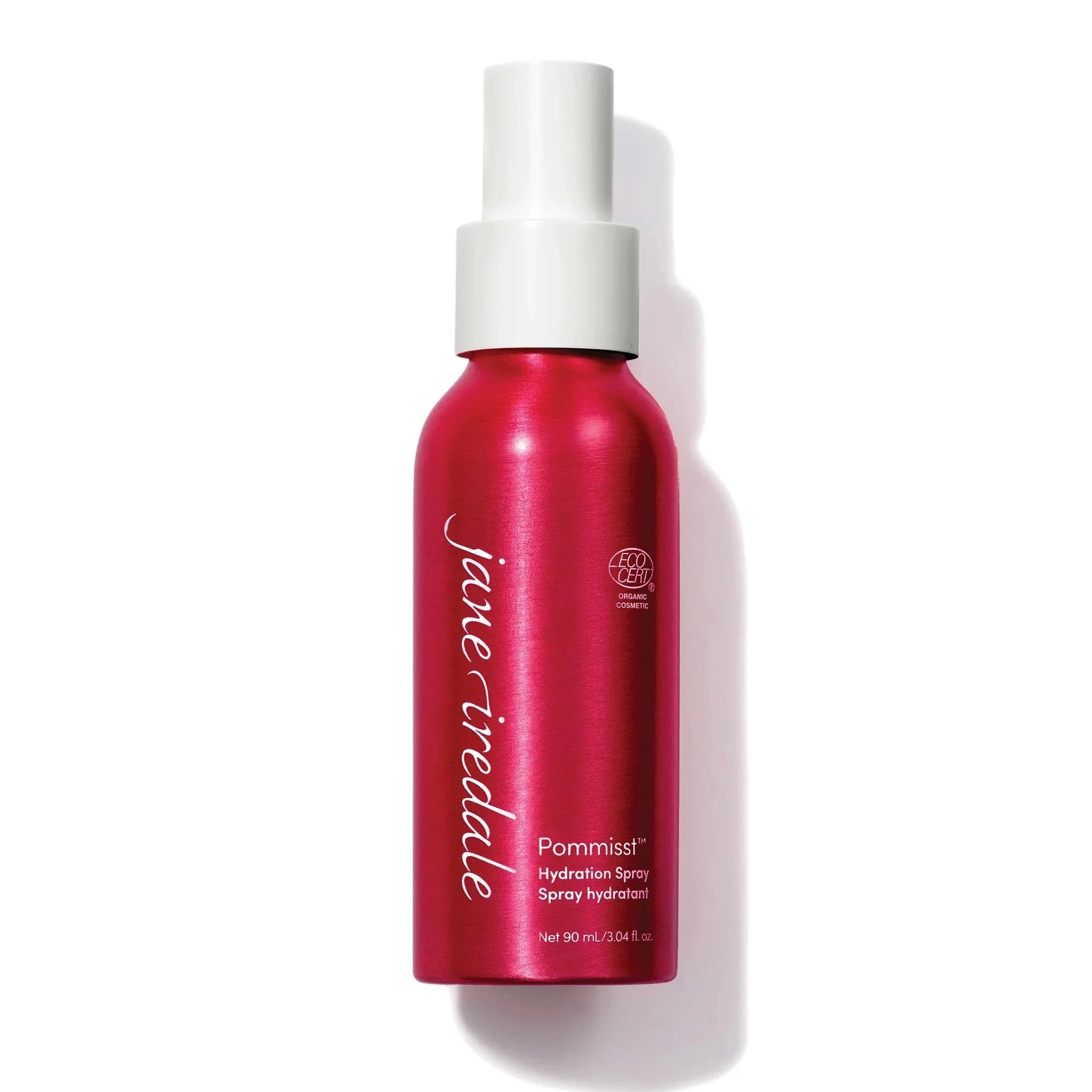 Jane-iredale-HydrationSpray-Pommisst_2048xwebp – Damara Luxury Spa Vancouver Close-up of a red cosmetic spray bottle with a white cap and visible text reading Hydration Spray (Pommist) on the label.