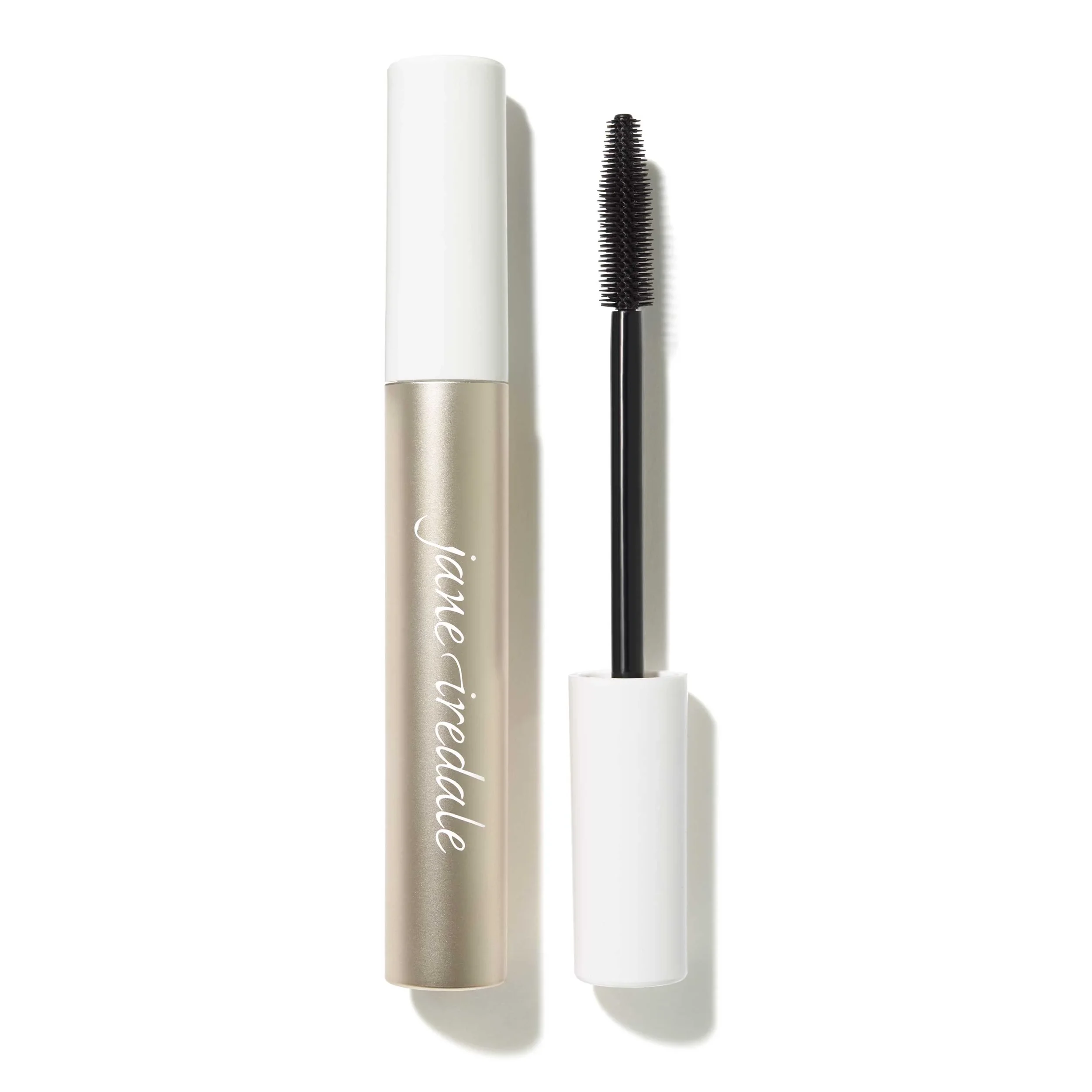Lash-Fixation_Mascara_SoldierBrown_PDP_1_3e7cc198-029f-42e3-a881-857ff925af66_5000xwebp – Damara Luxury Spa Vancouver White cylindrical cosmetic bottle paired with a black mascara wand on a white background.
