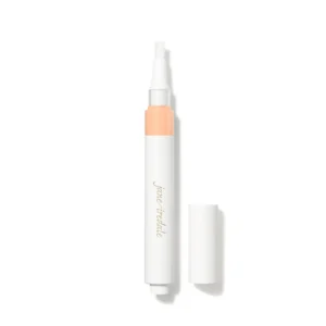 Close-up of a white cosmetic pen with a peach band and gold cursive lettering against a white background.