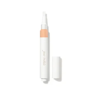 Close-up of a white cosmetic spray pen with a peach-colored band and cap, set against a white background.
