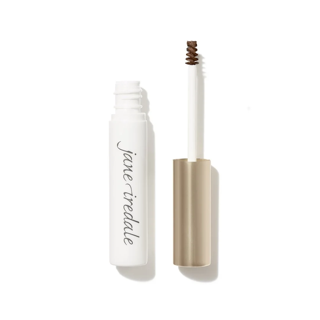 clearbrowgel1webp – Damara Luxury Spa Vancouver Mascara tube with a white body and a brown-bristled wand beside a gold cap, labeled Jane Iredale