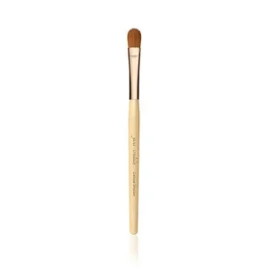 Single makeup brush with a light wooden handle, copper ferrule, and brown bristles on a white background.