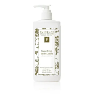 Éminence Stone Crop Body Lotion bottle with botanical gold-ink label and pump top