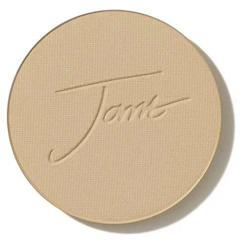 goldenglowwebp – Damara Luxury Spa Vancouver Round beige pressed powder compact with embossed cursive signature motif on lid.