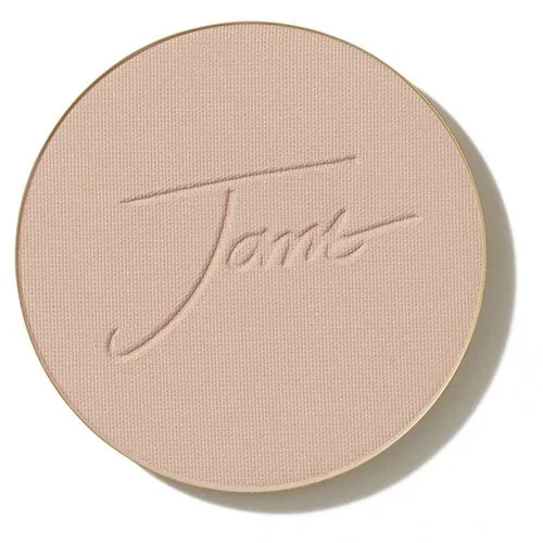 honeybronzewebp – Damara Luxury Spa Vancouver Round pink pressed powder compact with an embossed cursive brand logo on top