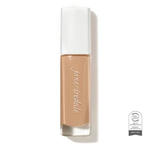 Nude liquid foundation in a glass bottle with a white cap on a white background. Brand name Jane Iredale is visible on the bottle.