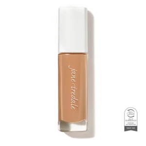 Lipstick tube with white cap and nude-brown lipstick, vertical orientation, seal visible on right side.