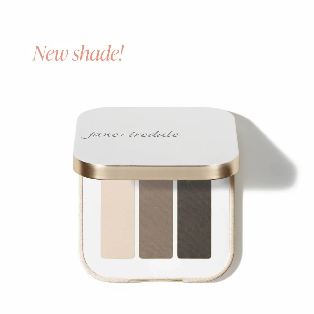 jane-iredale-riverstone_5000xwebp – Damara Luxury Spa Vancouver Compact eyeshadow palette with three neutral shades (cream, taupe, espresso); 'New shade!' text above.
