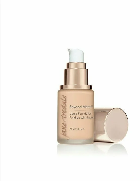 m2 – Damara Luxury Spa Vancouver Liquid foundation bottle with pump labeled 'Beyond Matte' by Jane Iredale; beige container with cap set beside it on a white background.