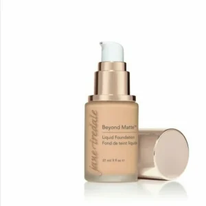 Jane Iredale Beyond Matte liquid foundation bottle with pump in beige shade, cap resting beside the bottle
