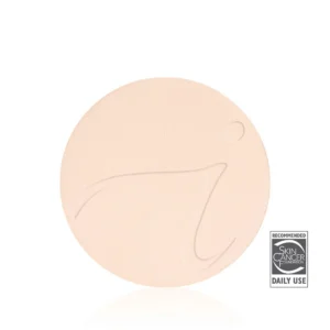 Partial peach-colored circle with a textured surface; lower-right shows a Skin Cancer Foundation 'Recommended Daily Use' badge.