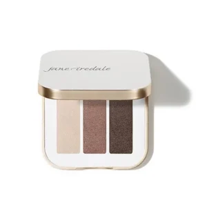 Compact eyeshadow palette with four neutral shades (beige to brown) in a white-and-gold case labeled Jane Iredale.