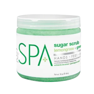 Green sugar scrub in a white jar, label reads 'sugar scrub lemongrass + green'.