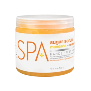 Jar of orange sugar scrub labeled SPA with mandarin + mango scent