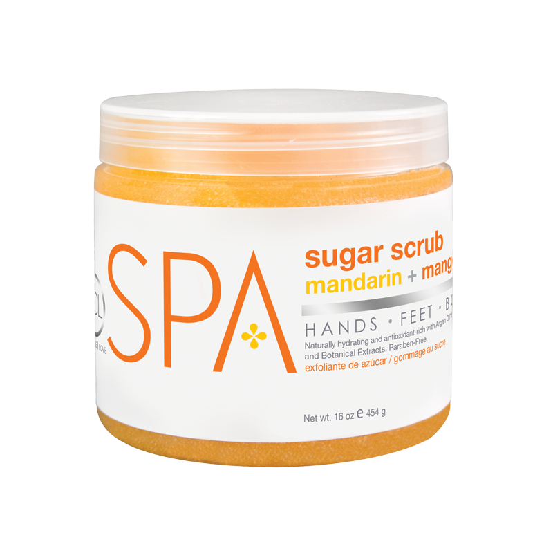 sugar-scrub-mandarin-mango-16ozwebp – Damara Luxury Spa Vancouver Jar of orange sugar scrub labeled SPA with mandarin + mango scent
