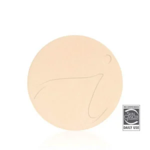 Beige pressed powder compact with a subtle decorative line on its surface and a small circular mark, featuring a Skin Cancer Foundation Daily Use logo in the corner.